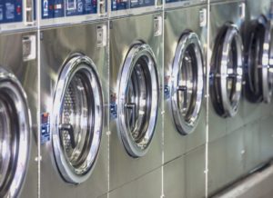 A Row of Washing Machines | Commercial Dryer Vent Cleaning | Envirovac