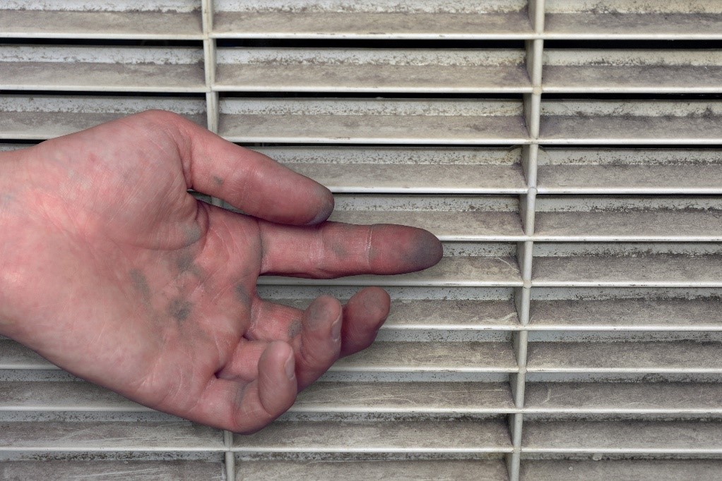 Hands Pointing to Black Dust in Vents | Air Ducts Mold | Envirovac